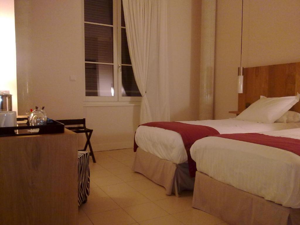 L'Armateur Hotell Moissac Rom bilde