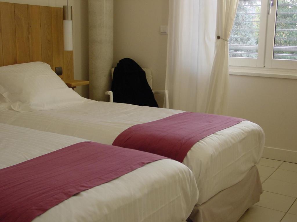 L'Armateur Hotell Moissac Rom bilde